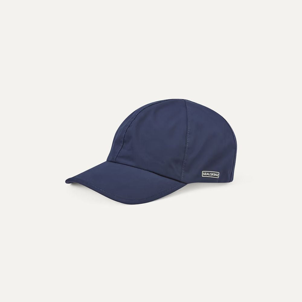 Angled View Of Navy Waterproof All Weather Cap.