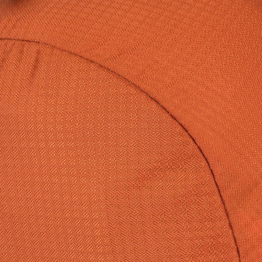Detailed texture of rust-colored fabric material.