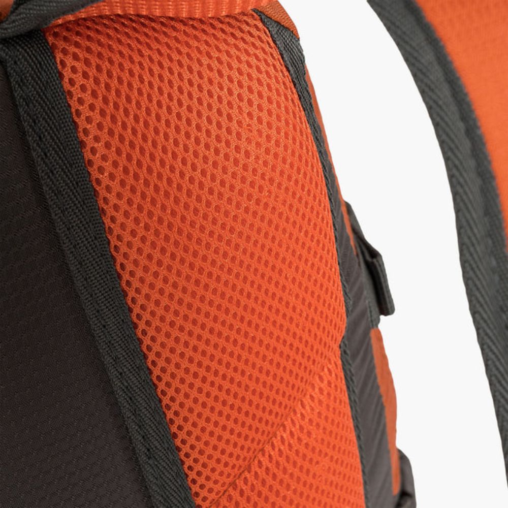 Back panel mesh detail for ventilation and comfort.