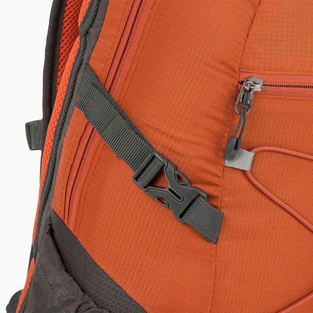 Adjustable side strap with buckle for a secure fit.
