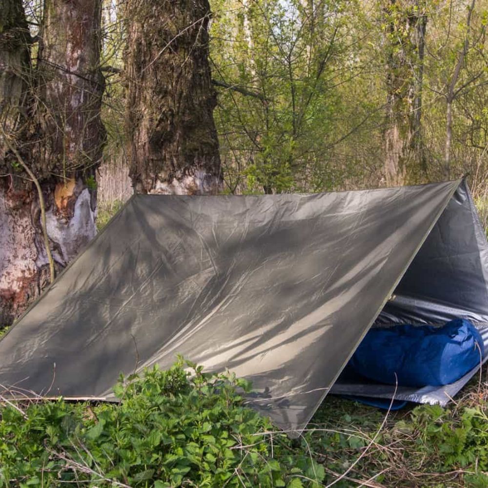 thermo-tarp single tent setup with sleeping bag.