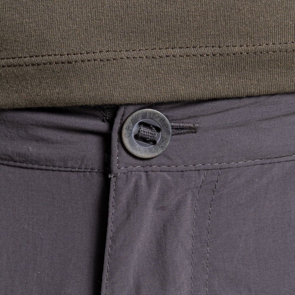 Close-up of the black button fastening on Men's NosiLife Cargo II Trousers in black pepper.