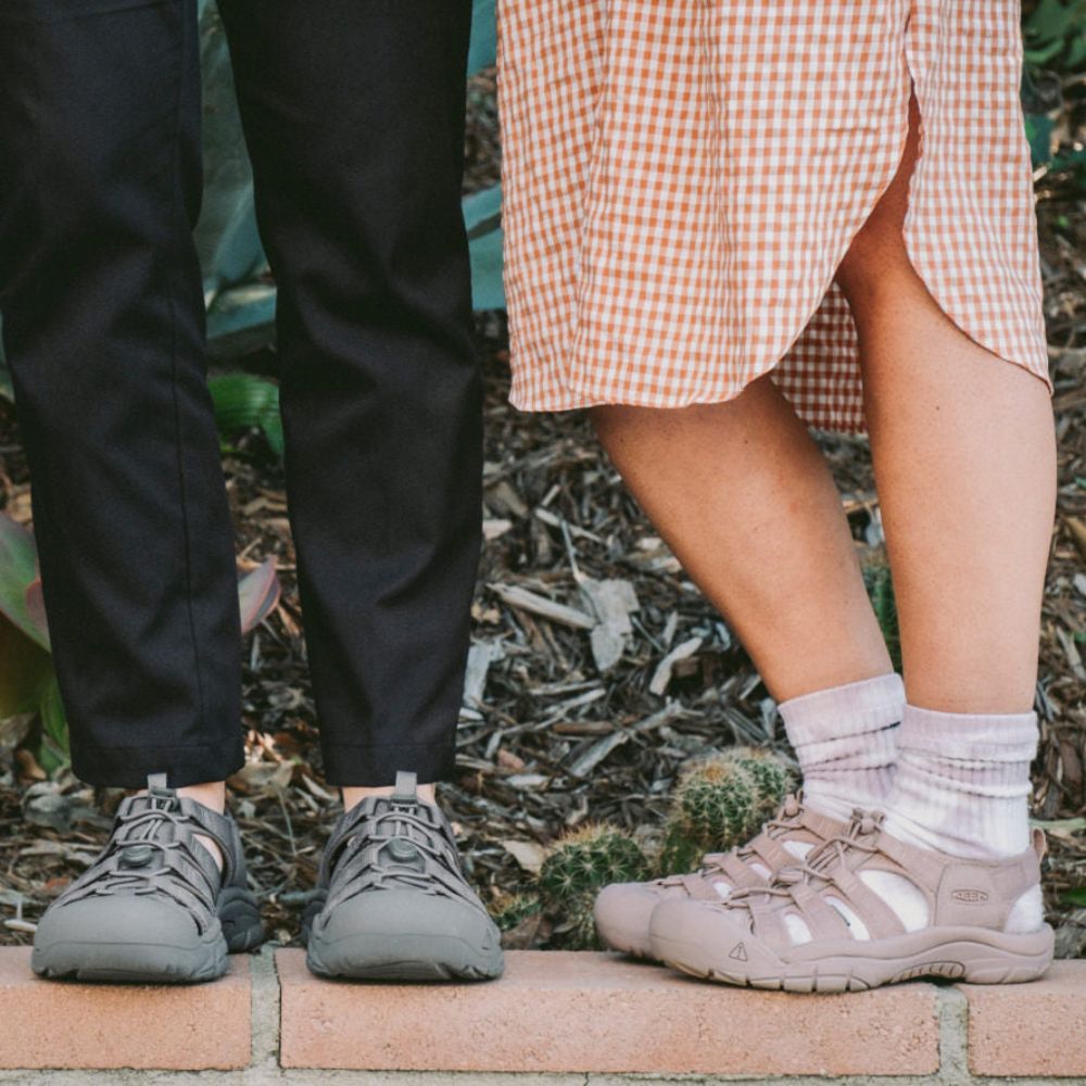 two persons wearing Newport H2 sandals.