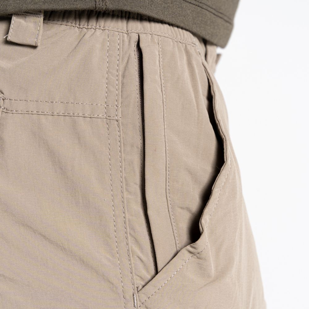 Detailed view of zippered pocket on the pebble-colored Men's NosiLife Cargo II Trousers.