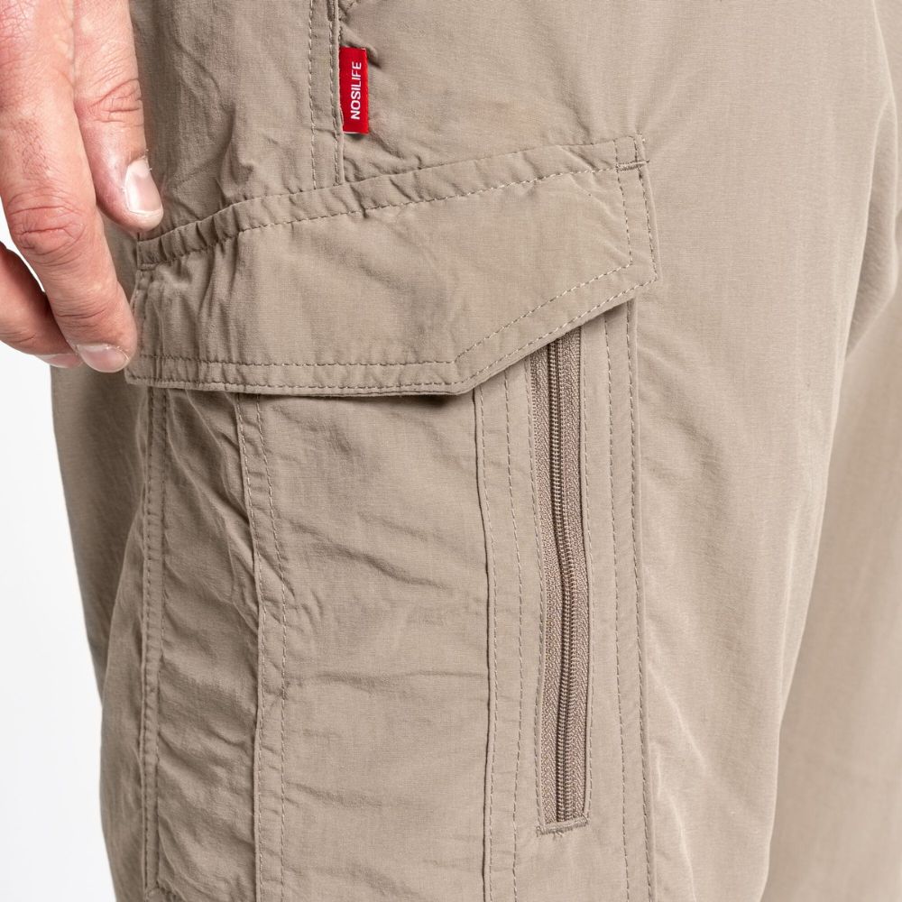 Side pocket detail on Men's NosiLife Cargo II Trousers showcasing secure zippers.