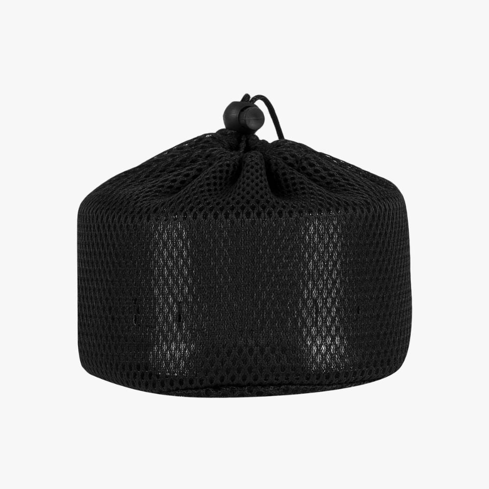 Cabar wood-burning stove in black mesh bag.