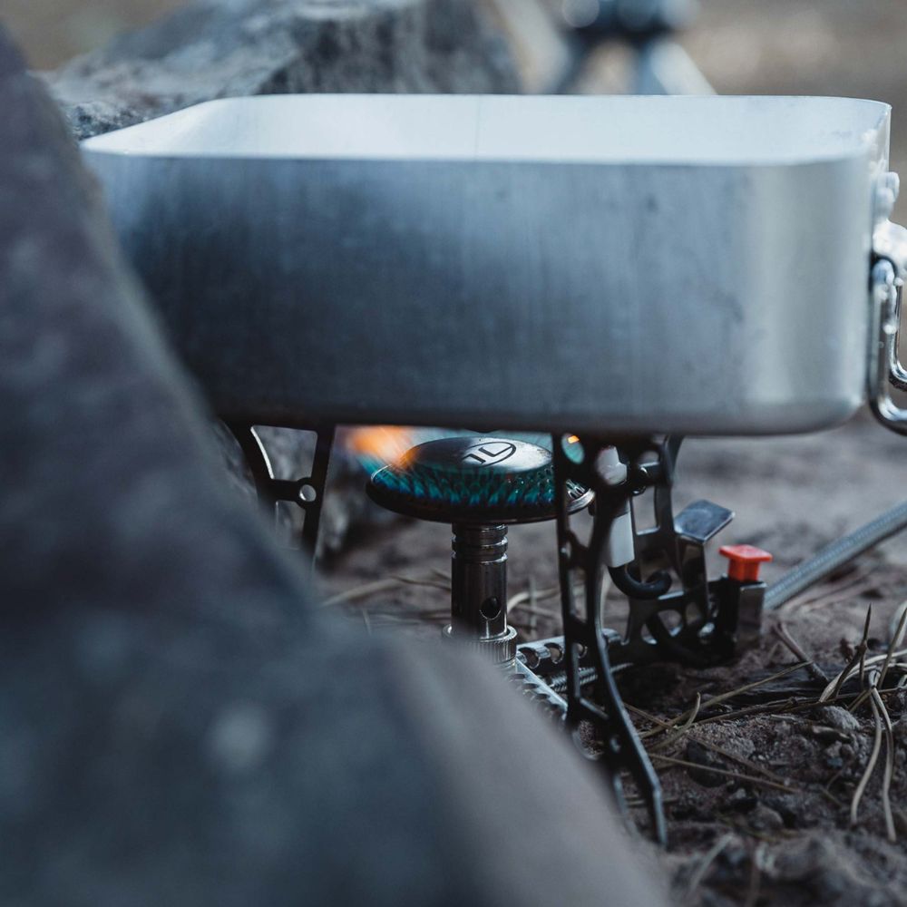 Close-up of Triplex Compact Camping Gas Stove flame.